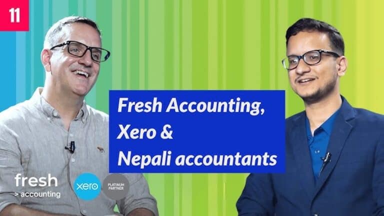 Two accountants discussing financial services for businesses.